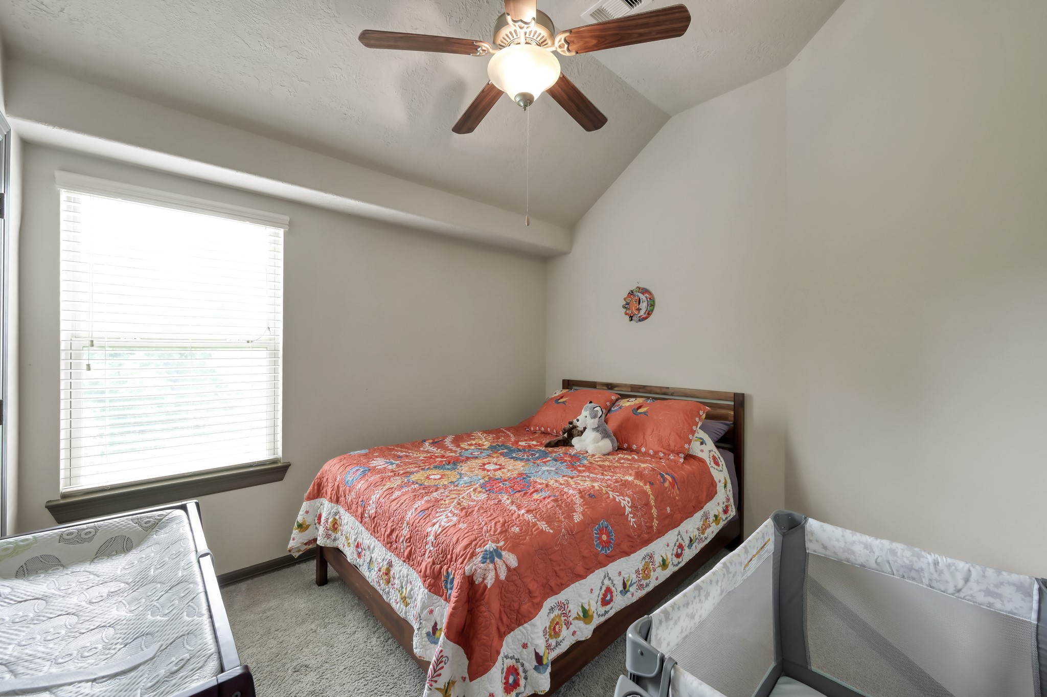 18 Aventura Place Spring, TX 77389 - Photo 31 of 43 a bedroom with a bed and window