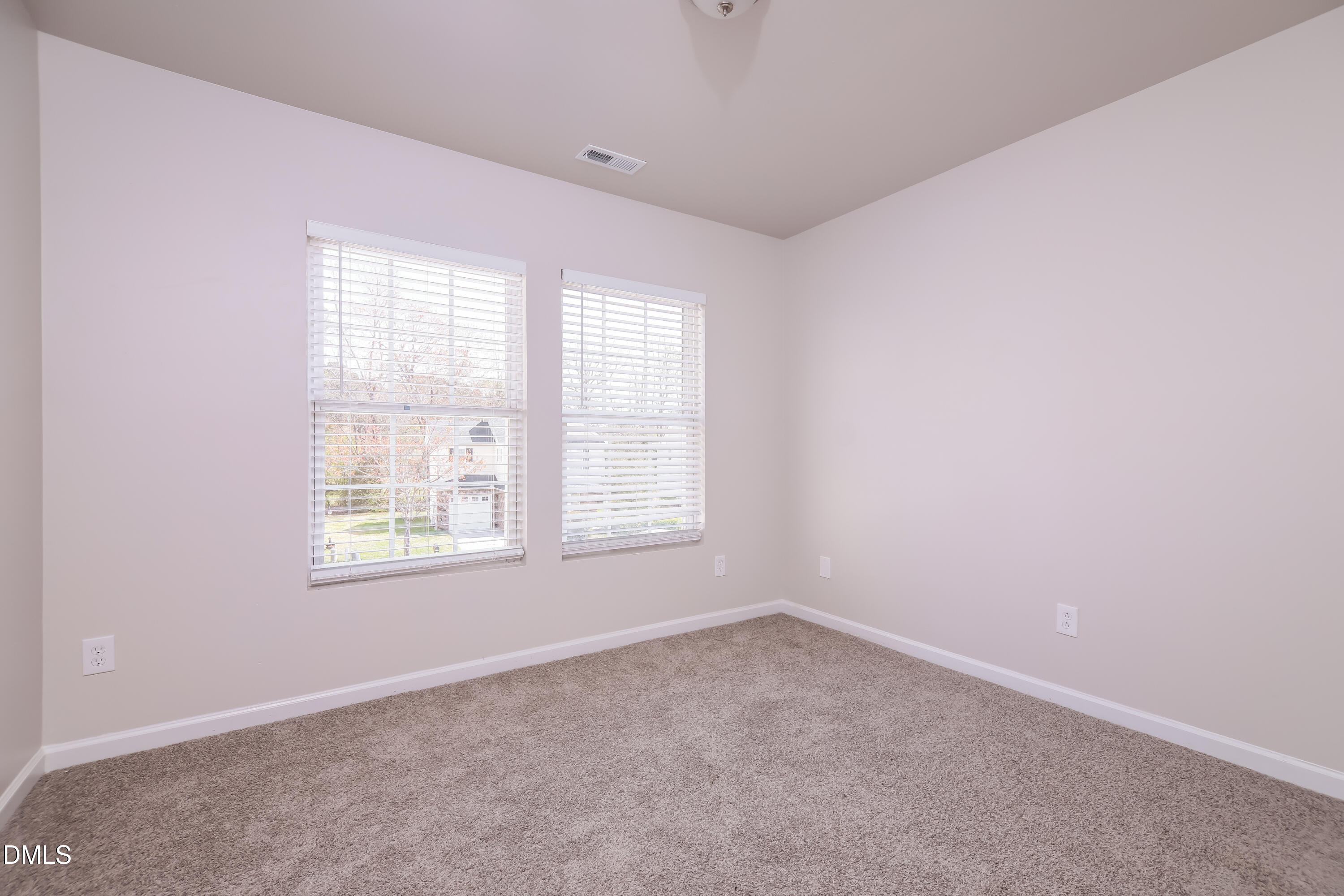 3716 Tryon Ridge Drive Raleigh, NC 27610 - Photo 11 of 17 an empty room with a window