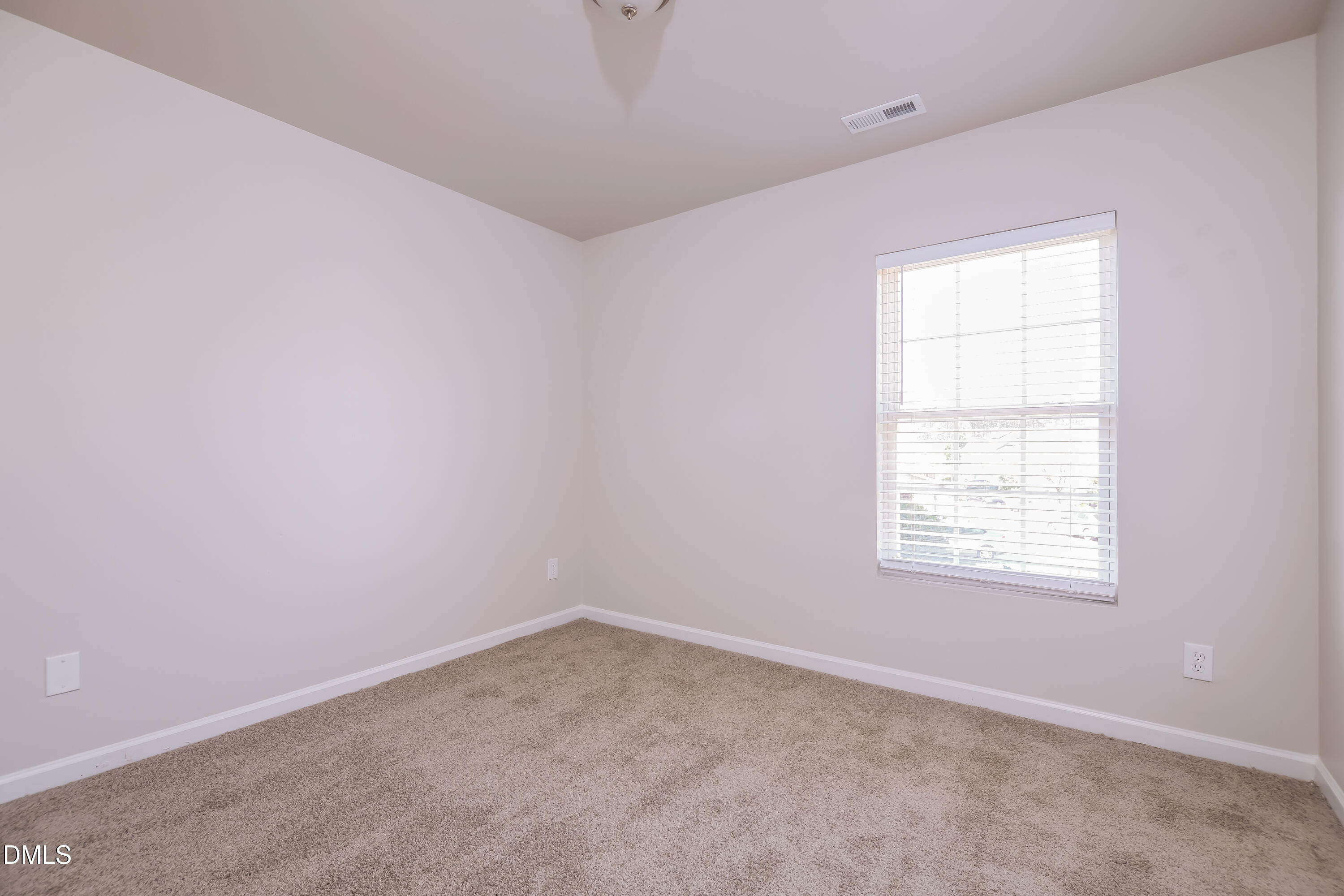 3716 Tryon Ridge Drive Raleigh, NC 27610 - Photo 12 of 17 an empty room with a window