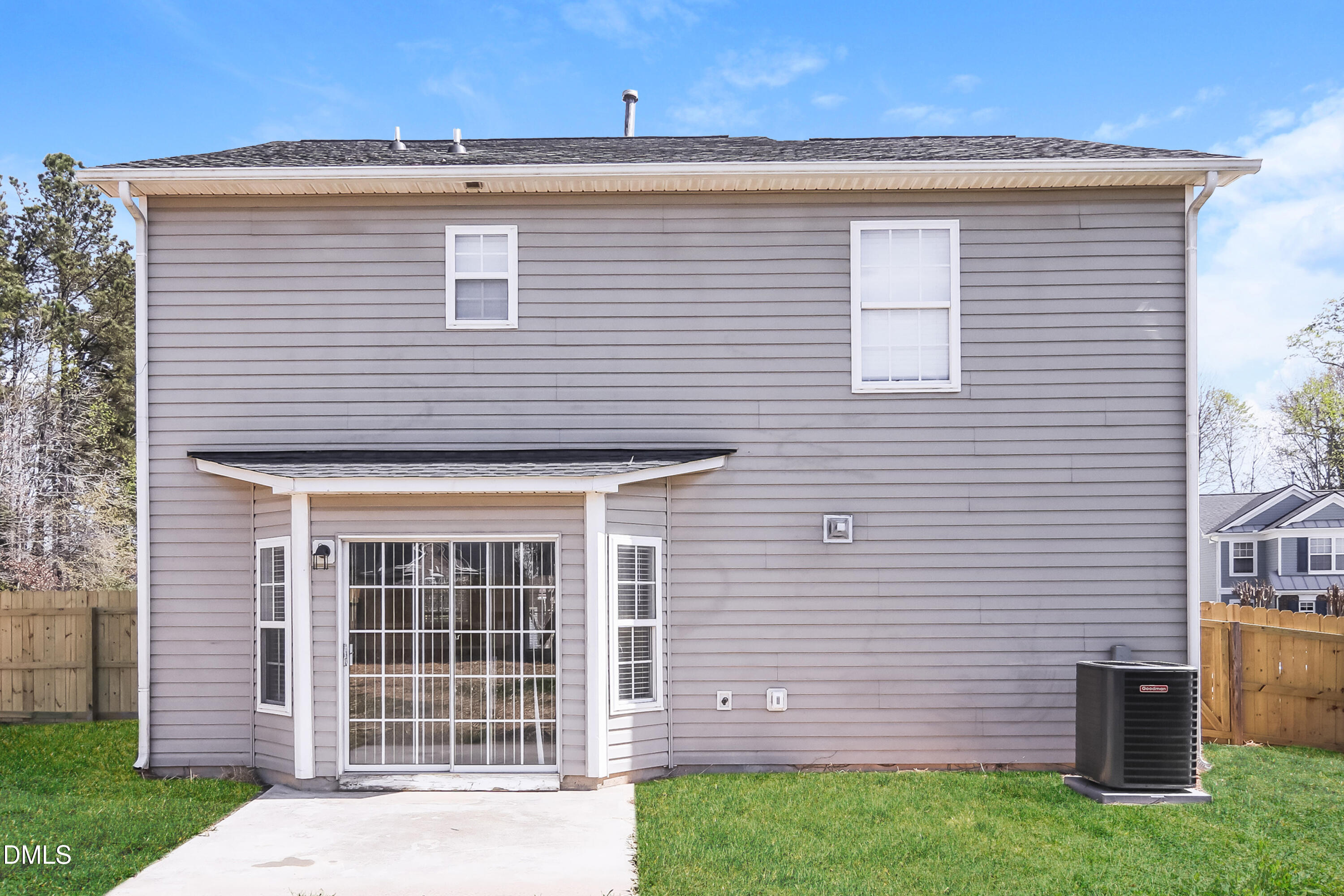 3716 Tryon Ridge Drive Raleigh, NC 27610 - Photo 15 of 17 a front view of a house with a yard