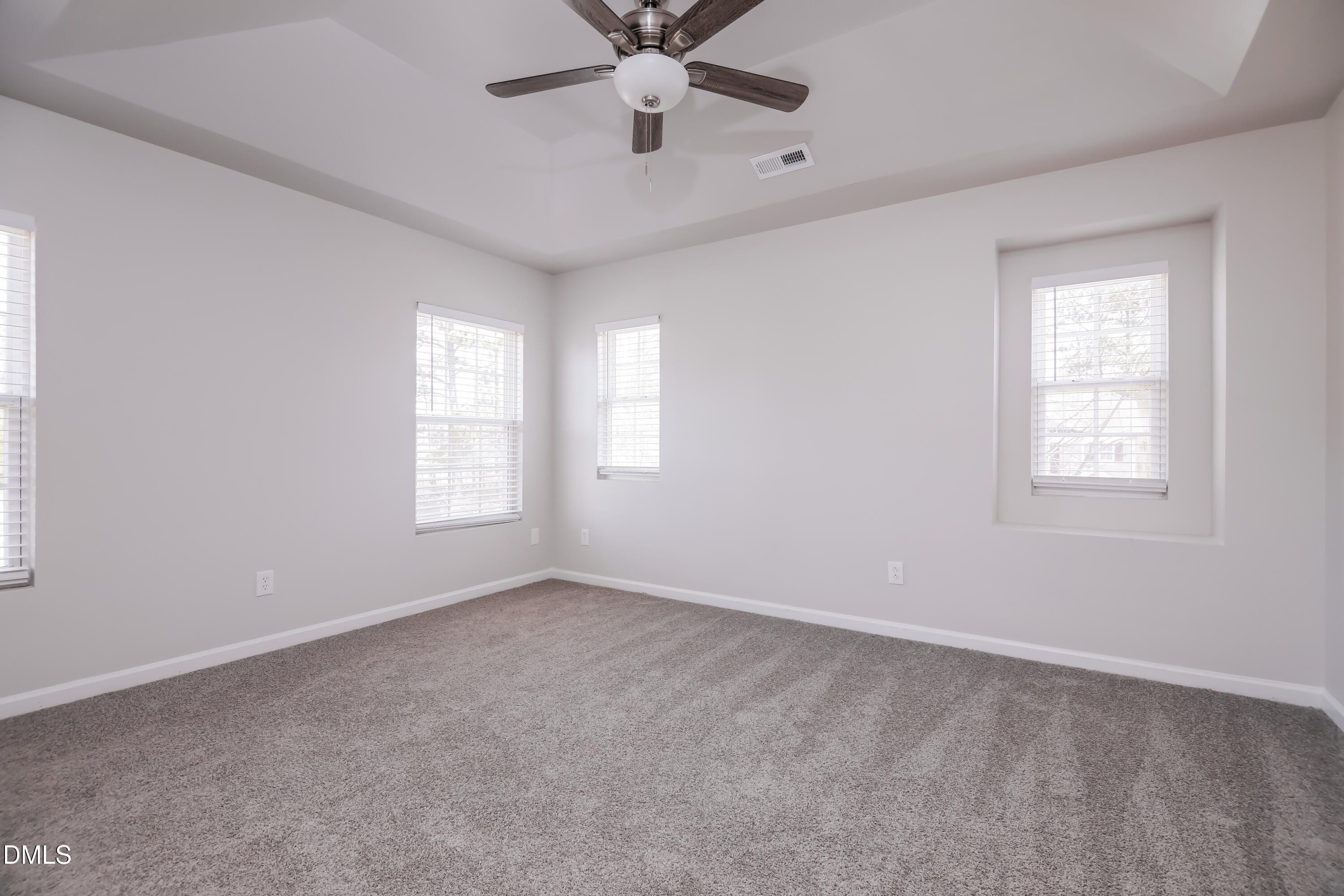 3716 Tryon Ridge Drive Raleigh, NC 27610 - Photo 7 of 17 a view of an empty room with a window