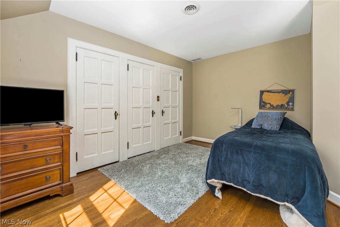 2960 Midvale Road Northwest Canton, OH 44718 - Photo 28 of 42 Bedroom with vaulted ceiling and wood-type flooring