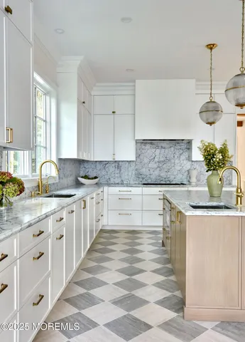 a dining room with a wooden table and chairs