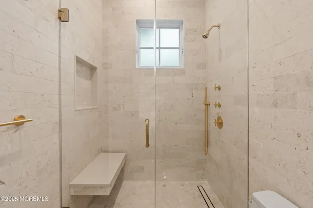 a view of a hallway with stairs