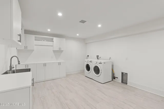 a view of swimming pool with a patio