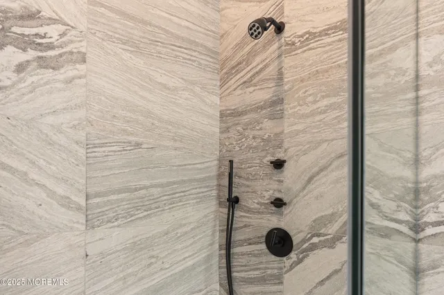 a view of a park with a tree in the background