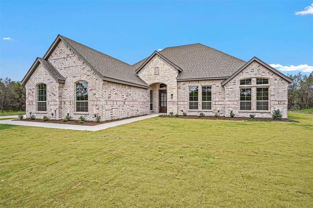 3800 Veal Station Road Weatherford, TX 76085 - Photo 1 of 1 a front view of a house with swimming pool