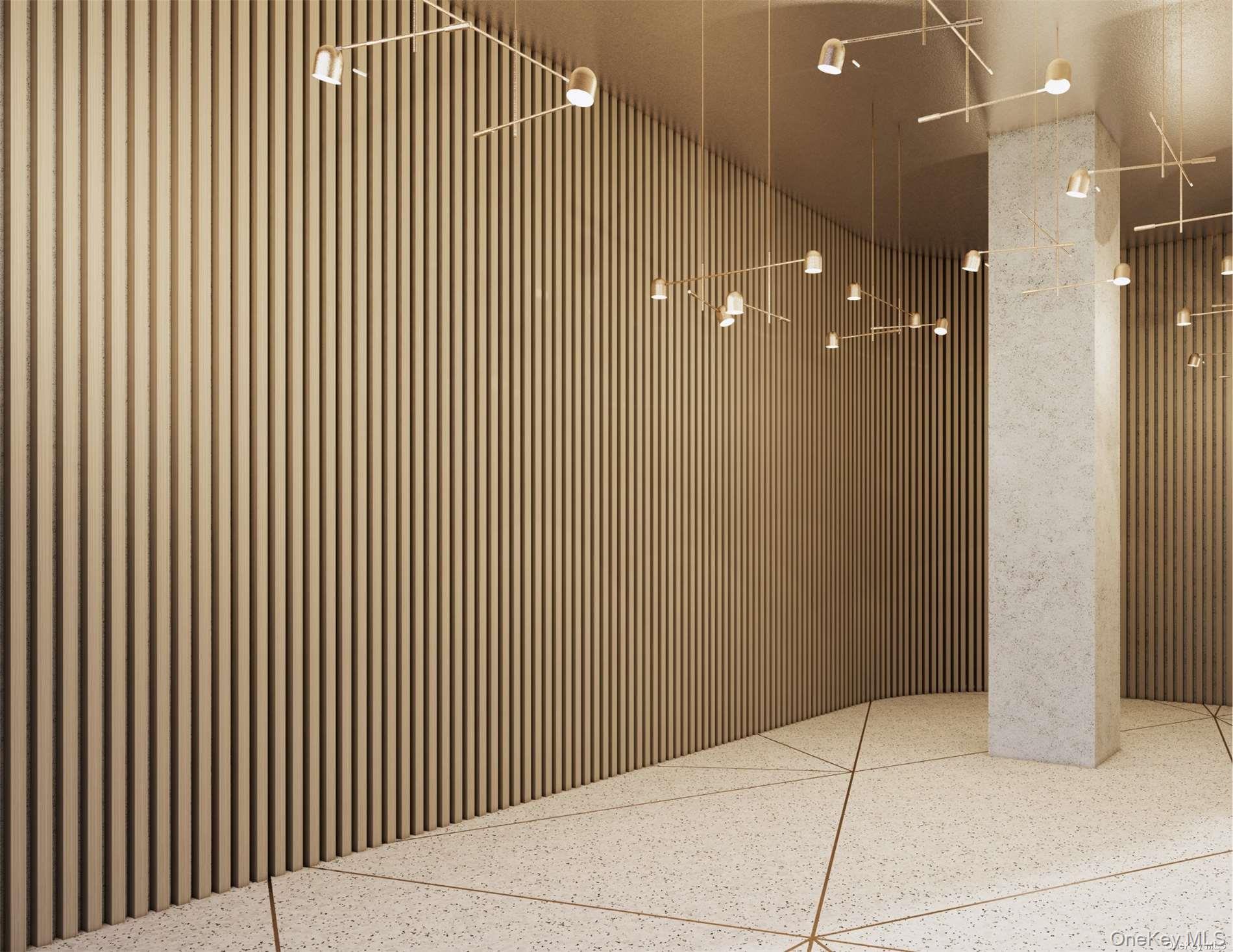 31-16 21st Street, Unit PH2D Queens, NY 11106 - Photo 12 of 16 a view of an empty room with wooden floor