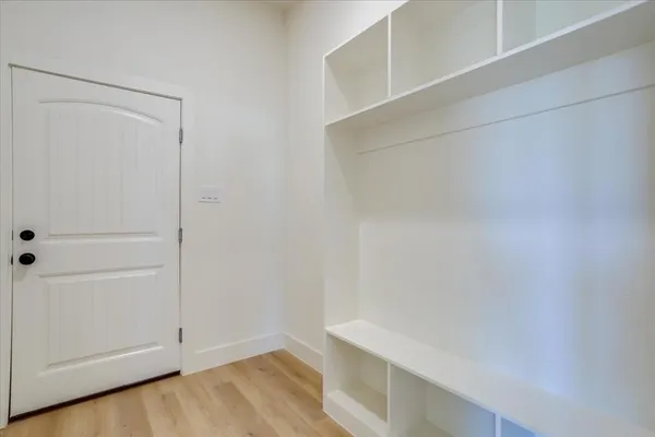 a view of an empty walk in closet