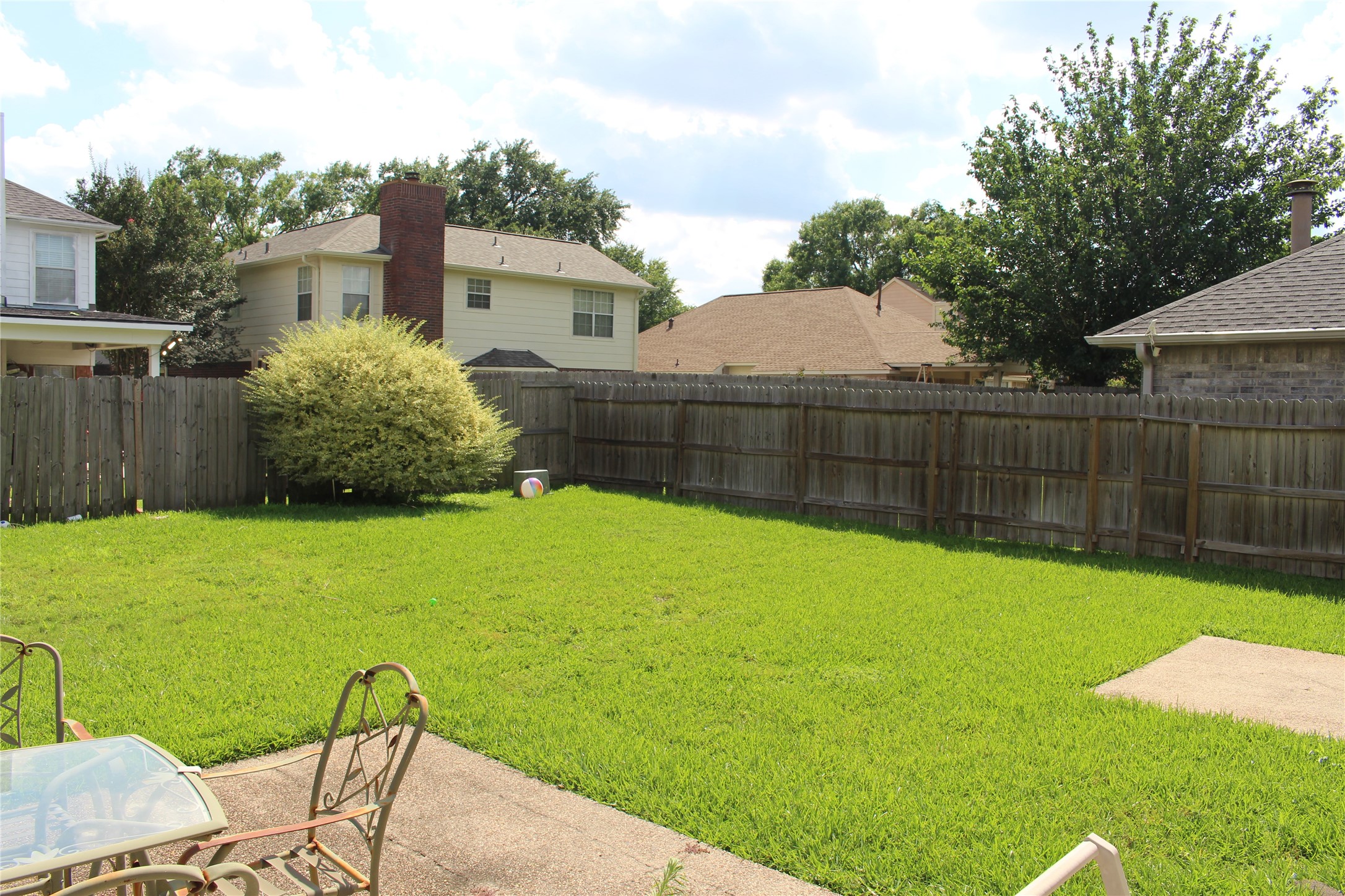4103 Sablemist Court Houston, TX 77014 - Photo 6 of 29 a view of a backyard with a garden and plants