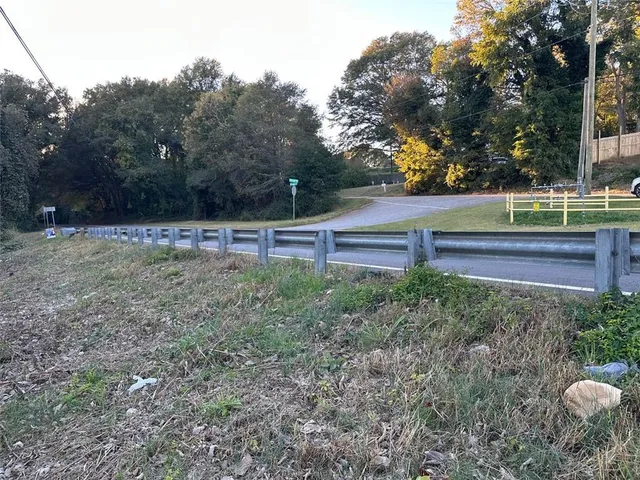 a view of outdoor space with deck and yard