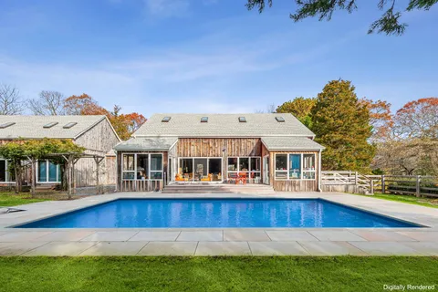 a view of a house with a swimming pool