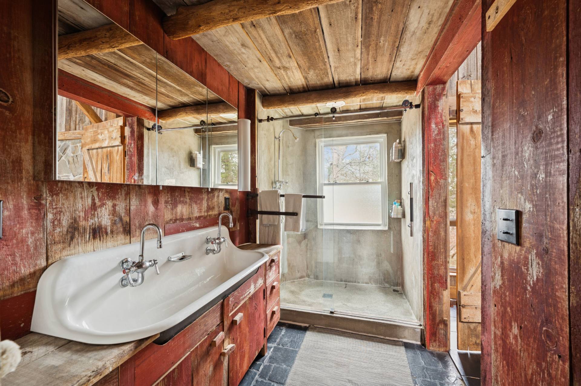 109 7 Ponds Road Water Mill, NY 11976 - Photo 23 of 32 a bathroom with a sink and a mirror