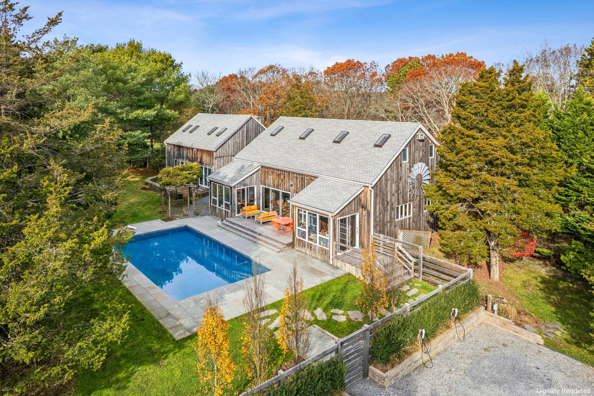 109 7 Ponds Road Water Mill, NY 11976 - Photo 26 of 32 an aerial view of a house with swimming pool and large trees