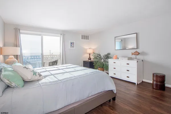 a bed room with a bed and a window