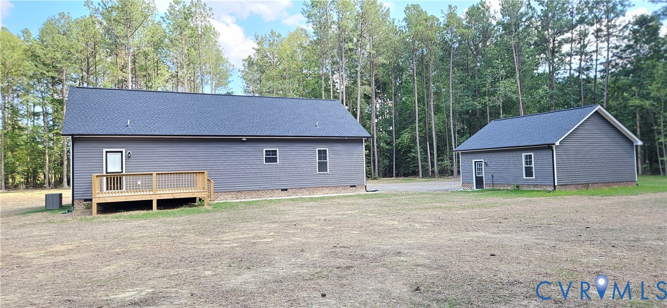 2982 Ashdale Road Center Cross, VA 22437 - Photo 4 of 23 Two structures featuring gray siding and dark shin