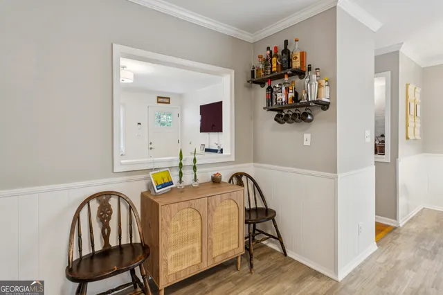 a view of a livingroom with furniture and toys