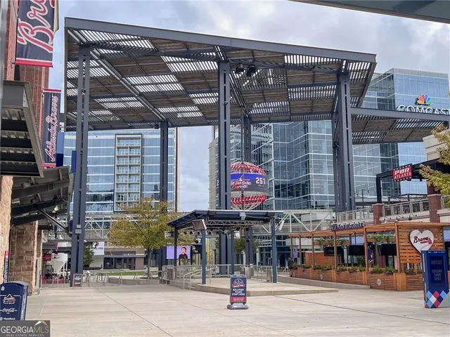 a front view of a building with garden
