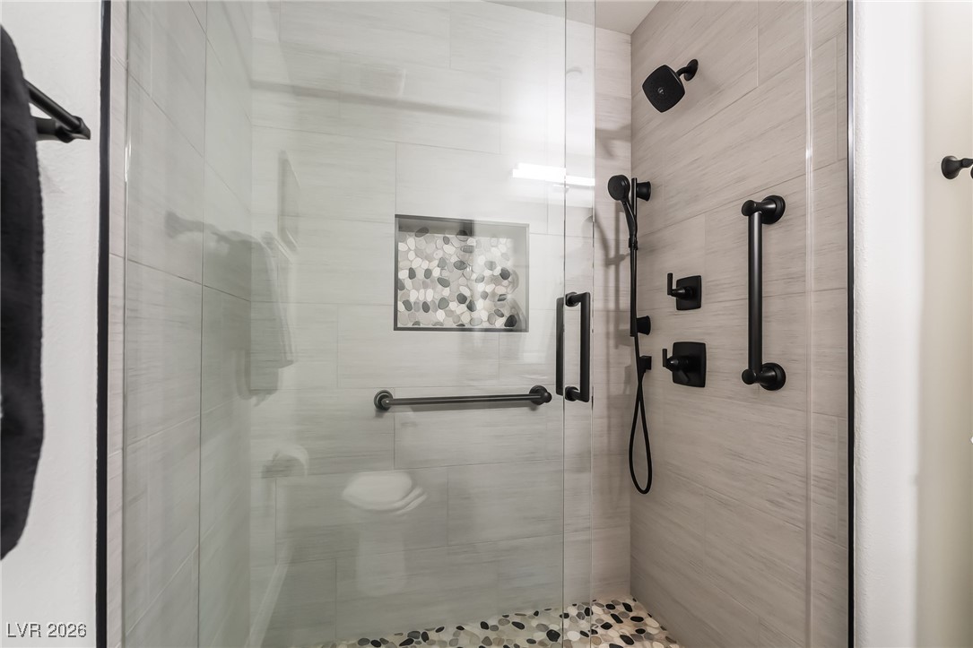 12235 Glass Desert Road, Unit 2 Las Vegas, NV 89183 - Photo 23 of 33 Bathroom featuring a shower stall