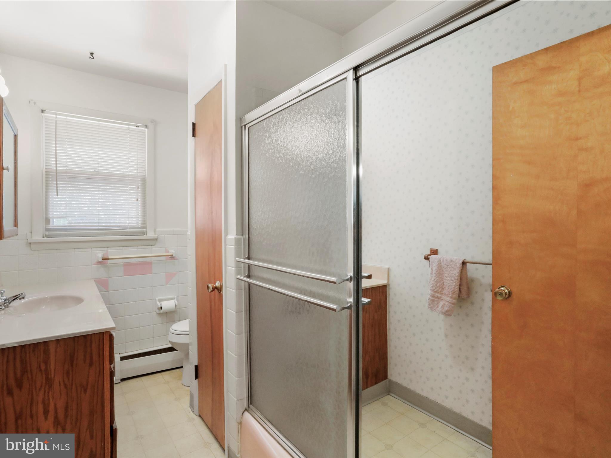 810 Winifred Road Cumberland, MD 21502 - Photo 14 of 45 a bathroom with a bathtub and a shower