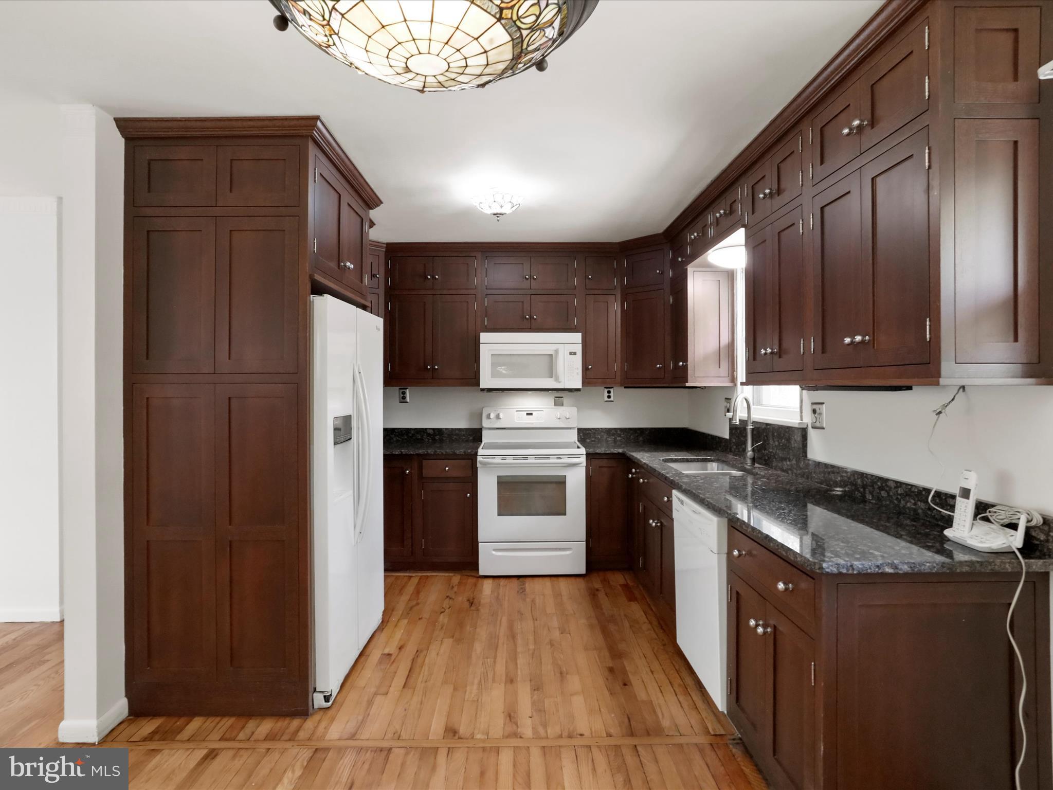 810 Winifred Road Cumberland, MD 21502 - Photo 4 of 45 a kitchen with stainless steel appliances granite countertop a stove a refrigerator and a sink