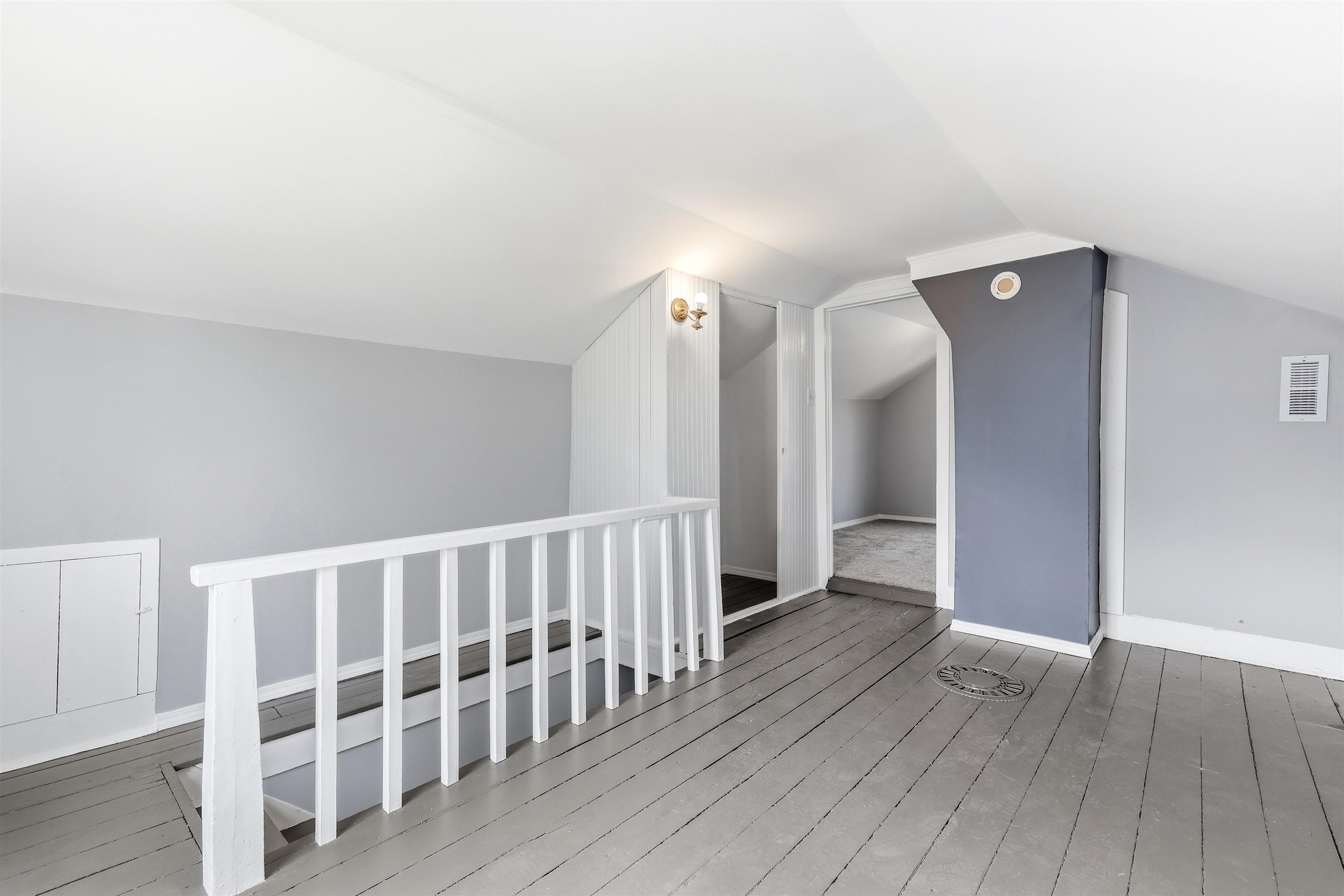 409 South Water Street Warren, IL 61087 - Photo 27 of 29 a view of a hallway with wooden floor and staircase