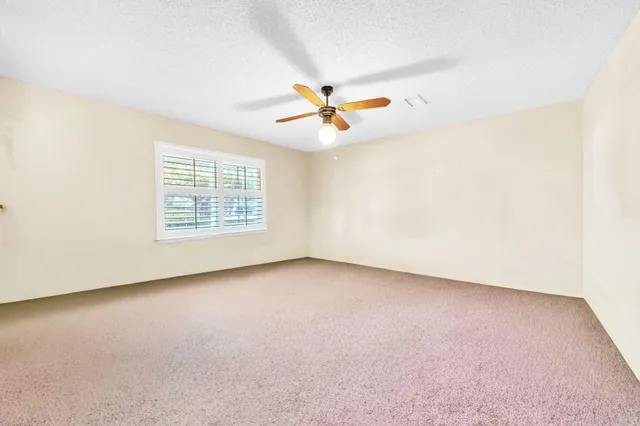 a kitchen with stainless steel appliances a refrigerator sink and cabinets
