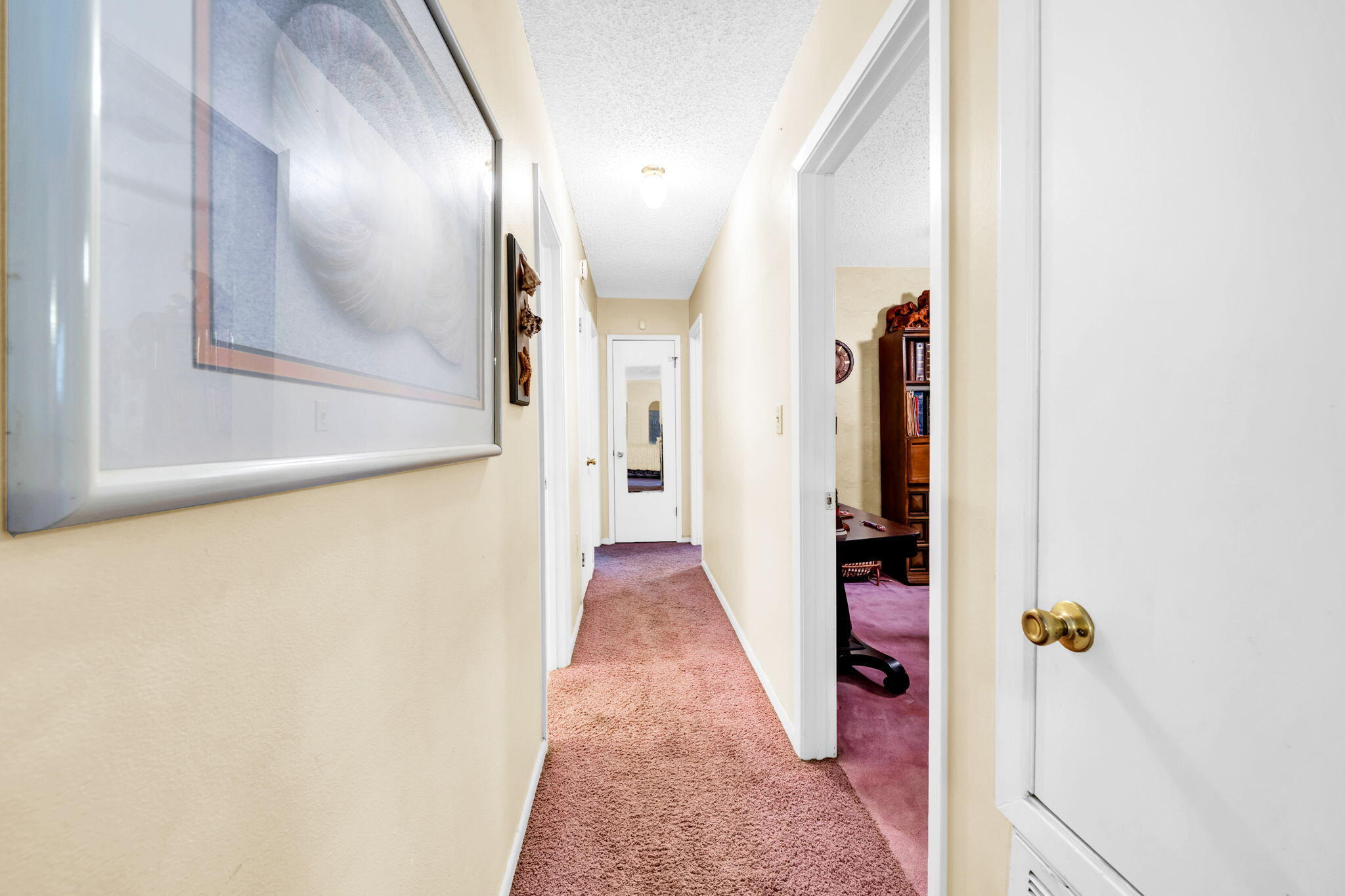 504 Kelly Street Destin, FL 32541 - Photo 27 of 92 a view of a hallway with wooden floor and entryway