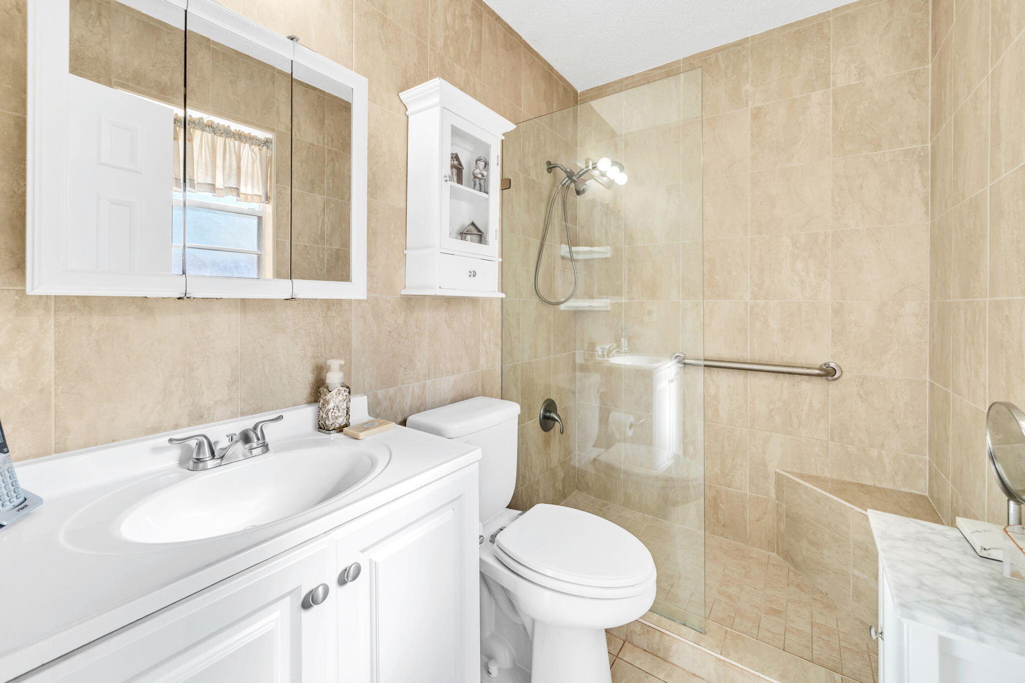 504 Kelly Street Destin, FL 32541 - Photo 35 of 92 a bathroom with a sink toilet and shower