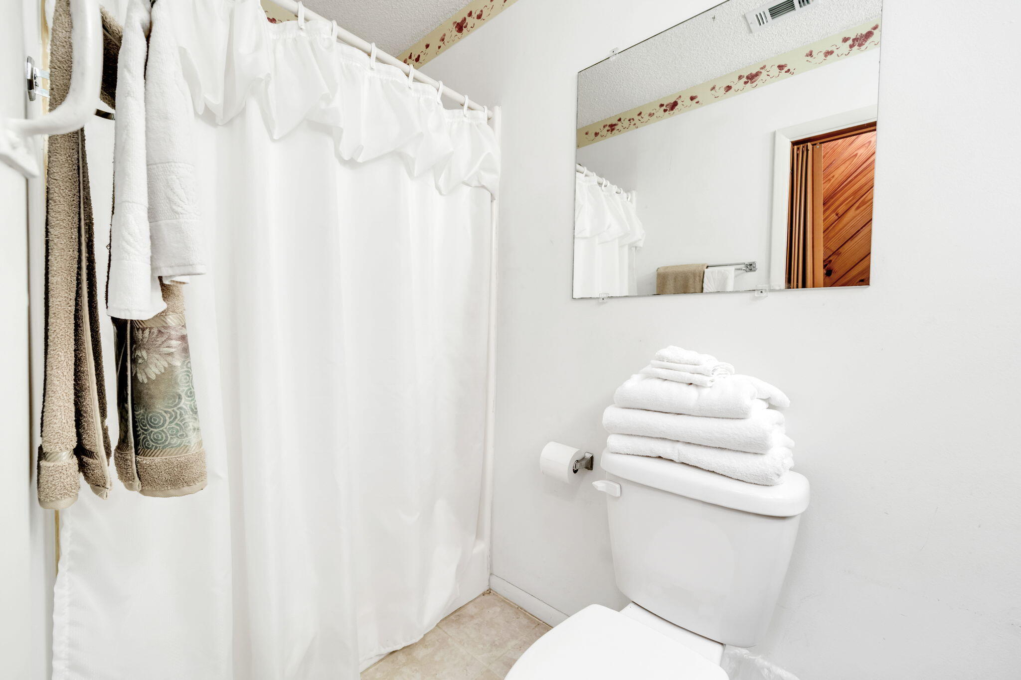 504 Kelly Street Destin, FL 32541 - Photo 38 of 92 a white toilet sitting next to a bathroom sink