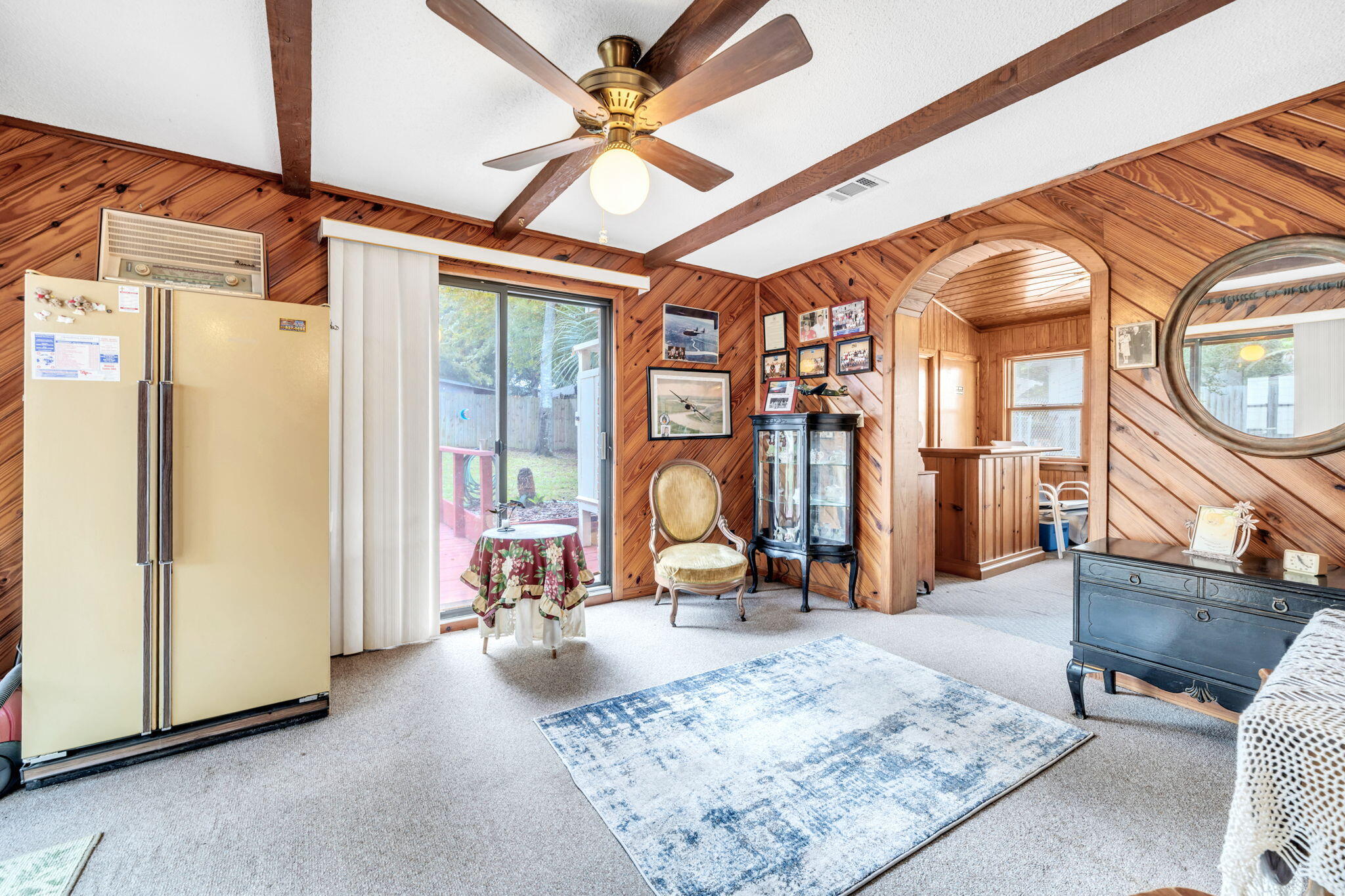 504 Kelly Street Destin, FL 32541 - Photo 41 of 92 a living room with furniture a rug and a large window