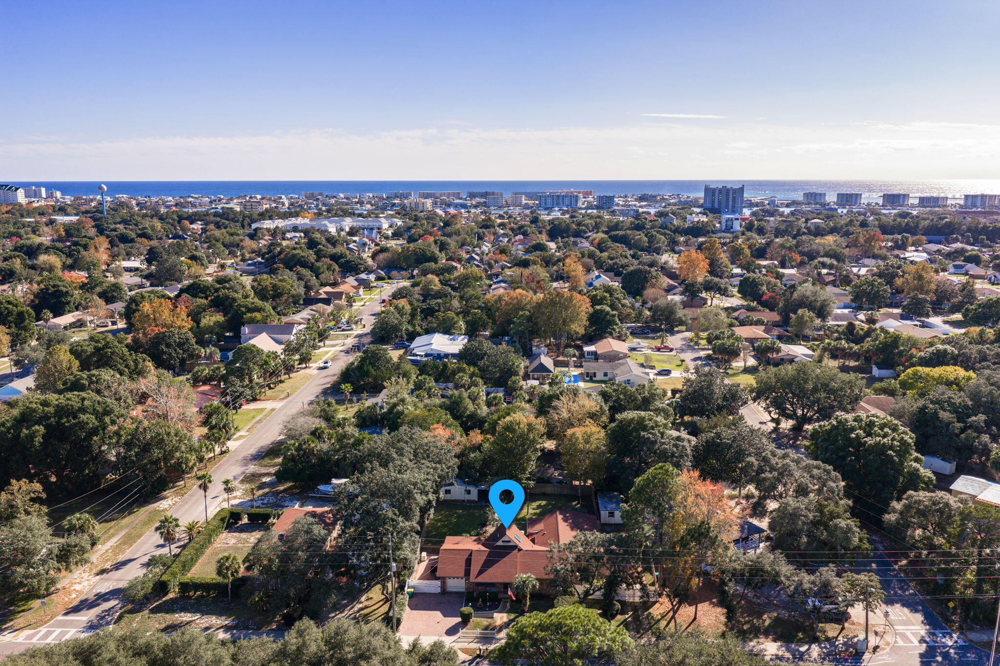 504 Kelly Street Destin, FL 32541 - Photo 74 of 92 an aerial view of a city with lots of residential buildings