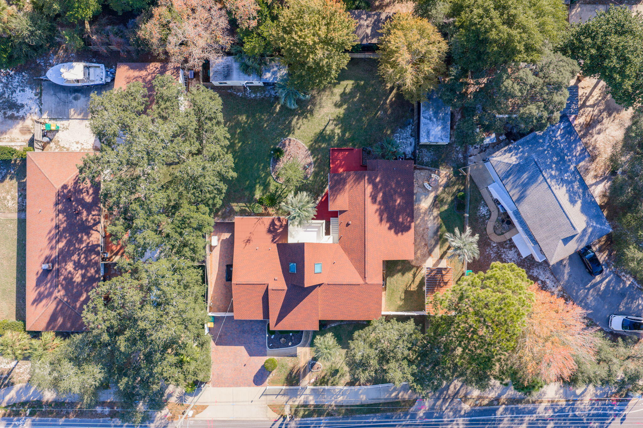 504 Kelly Street Destin, FL 32541 - Photo 78 of 92 an aerial view of a house with a yard and garden
