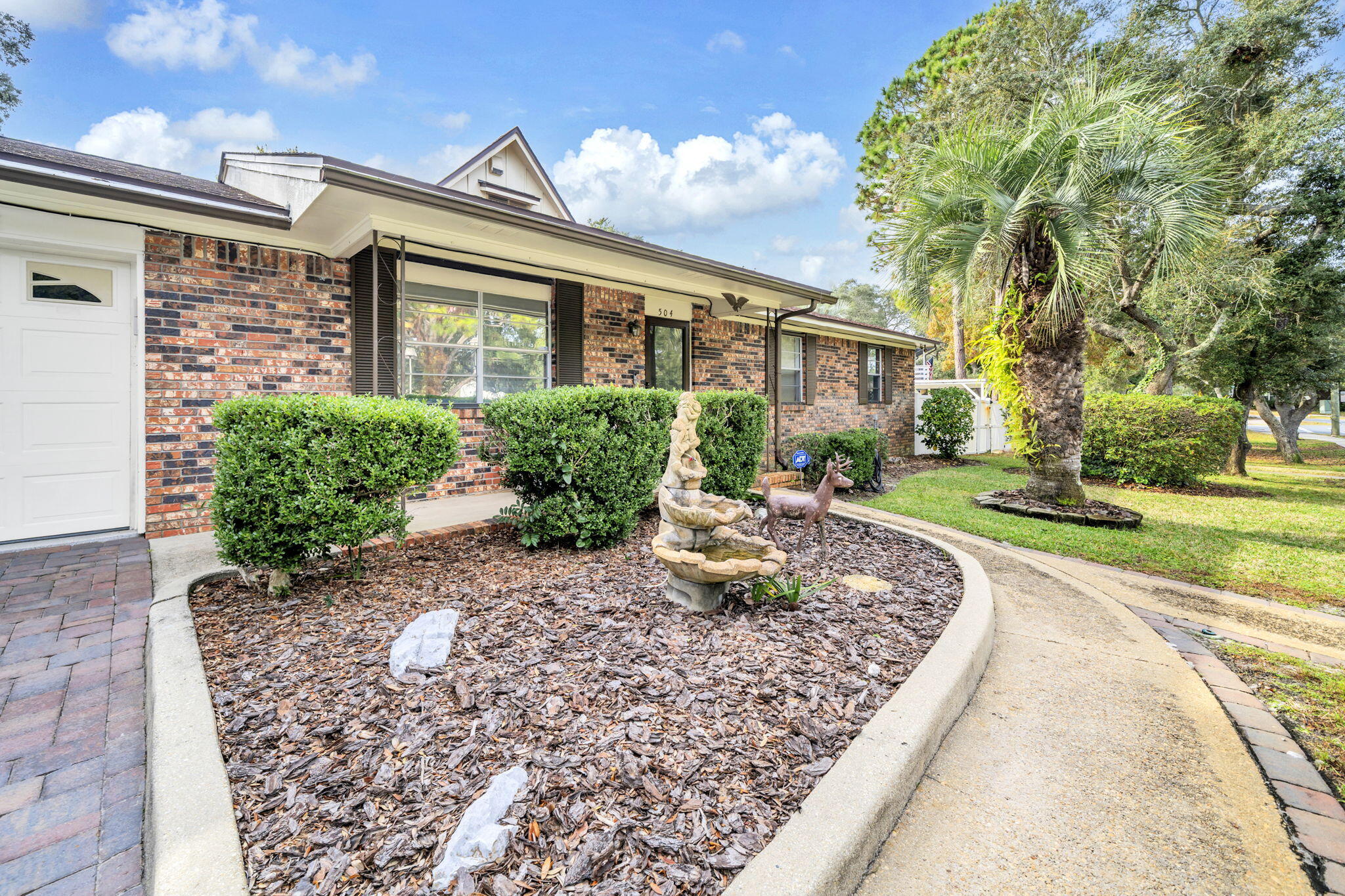 504 Kelly Street Destin, FL 32541 - Photo 86 of 92 front view of a house with a yard