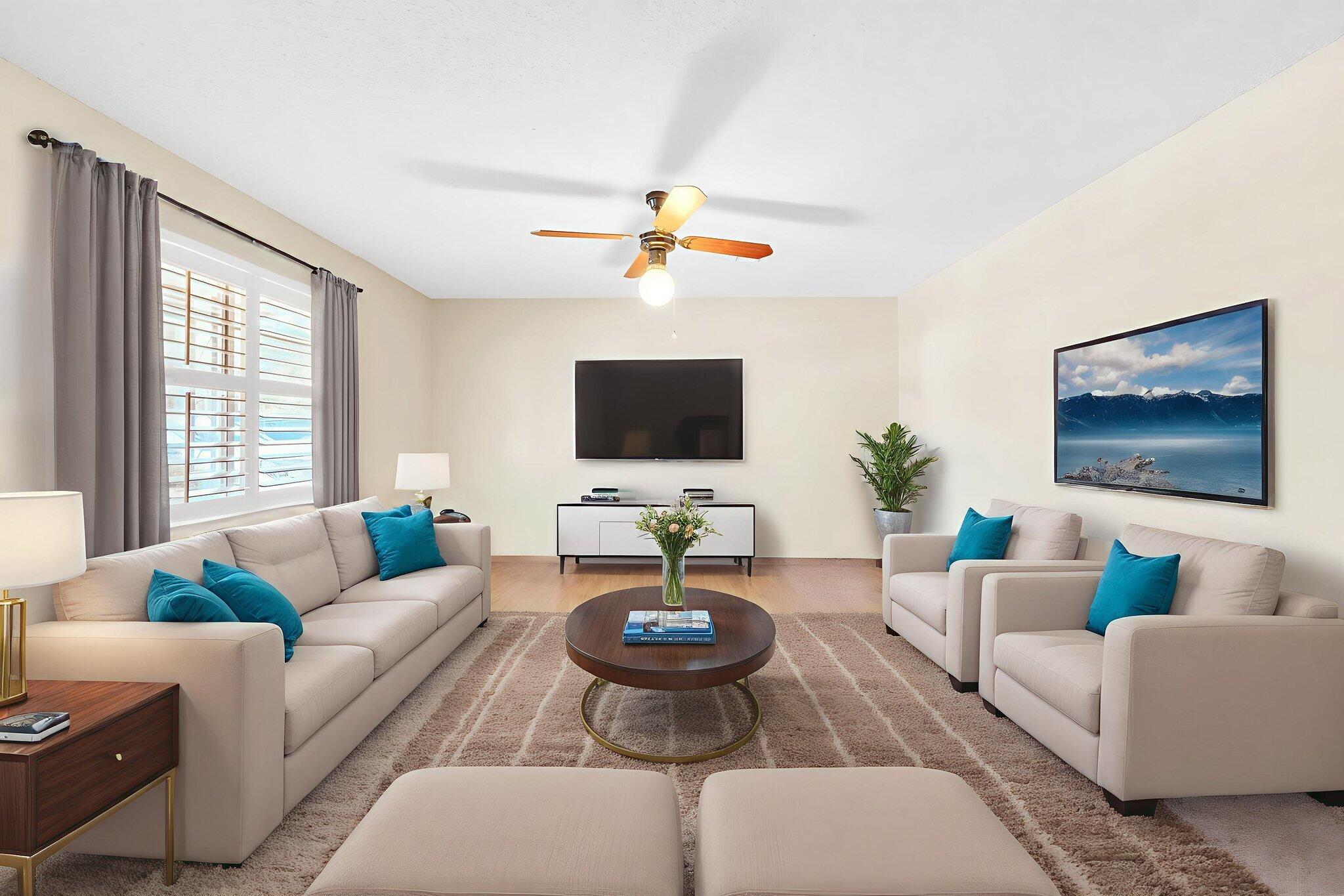 504 Kelly Street Destin, FL 32541 - Photo 9 of 92 a living room with furniture a flat screen tv and a large window