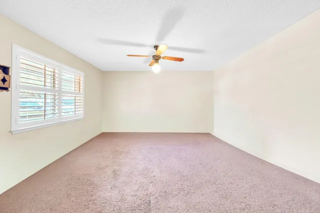 a kitchen with stainless steel appliances a sink and cabinets