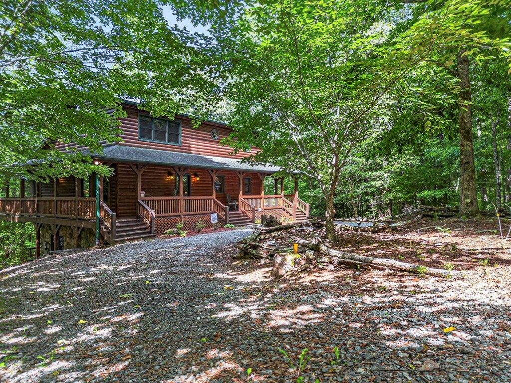 115 Lakota Trail Blue Ridge, GA 30513 - Photo 49 of 49 a view of a house with a yard