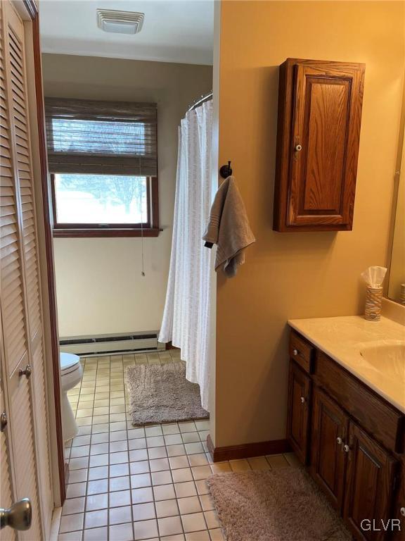 307 Gold Mill Road Wind Gap, PA 18091 - Photo 16 of 32 a bathroom with a sink a toilet and mirror