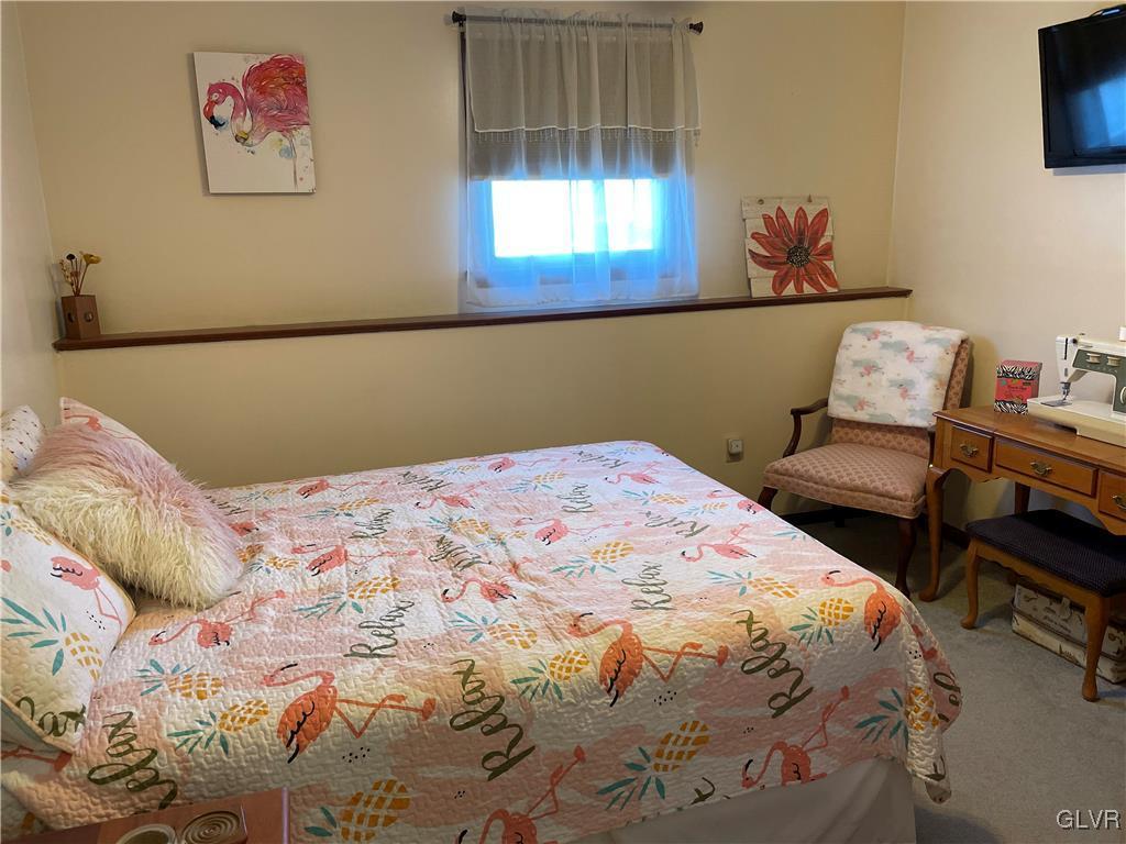 307 Gold Mill Road Wind Gap, PA 18091 - Photo 19 of 32 a bedroom with a bed and a window