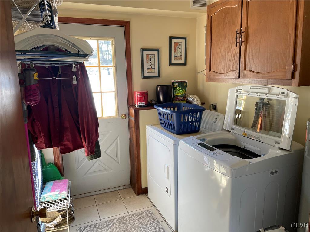 307 Gold Mill Road Wind Gap, PA 18091 - Photo 20 of 32 a kitchen with a stove and a refrigerator