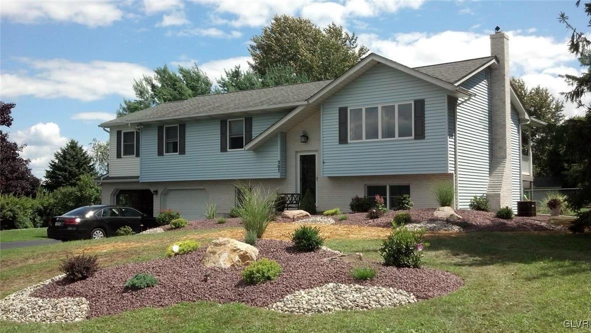 307 Gold Mill Road Wind Gap, PA 18091 - Photo 2 of 32 a view of a house with a patio