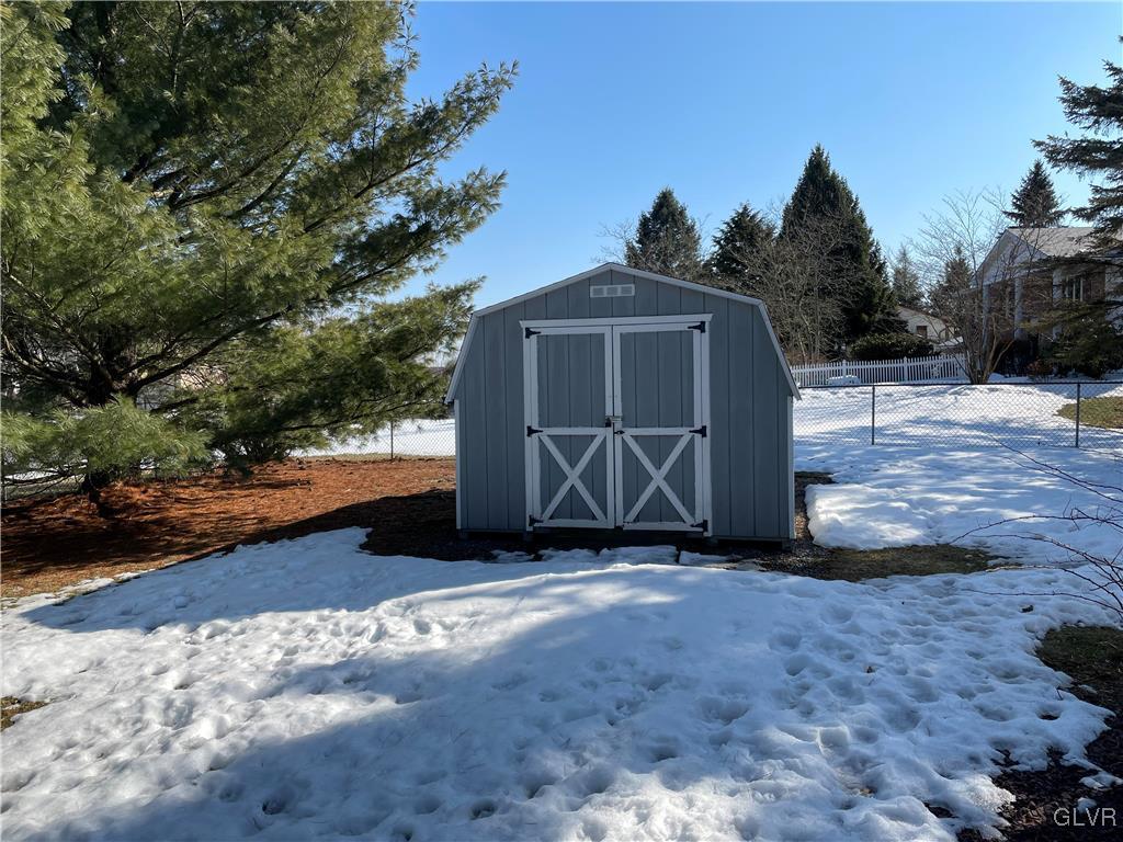 307 Gold Mill Road Wind Gap, PA 18091 - Photo 30 of 32 a view of a grey house with a yard