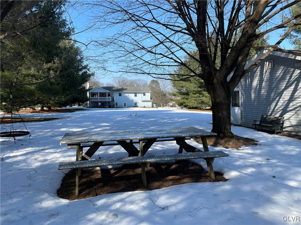 307 Gold Mill Road Wind Gap, PA 18091 - Photo 31 of 32 a view of backyard with wooden floor and outdoor seating