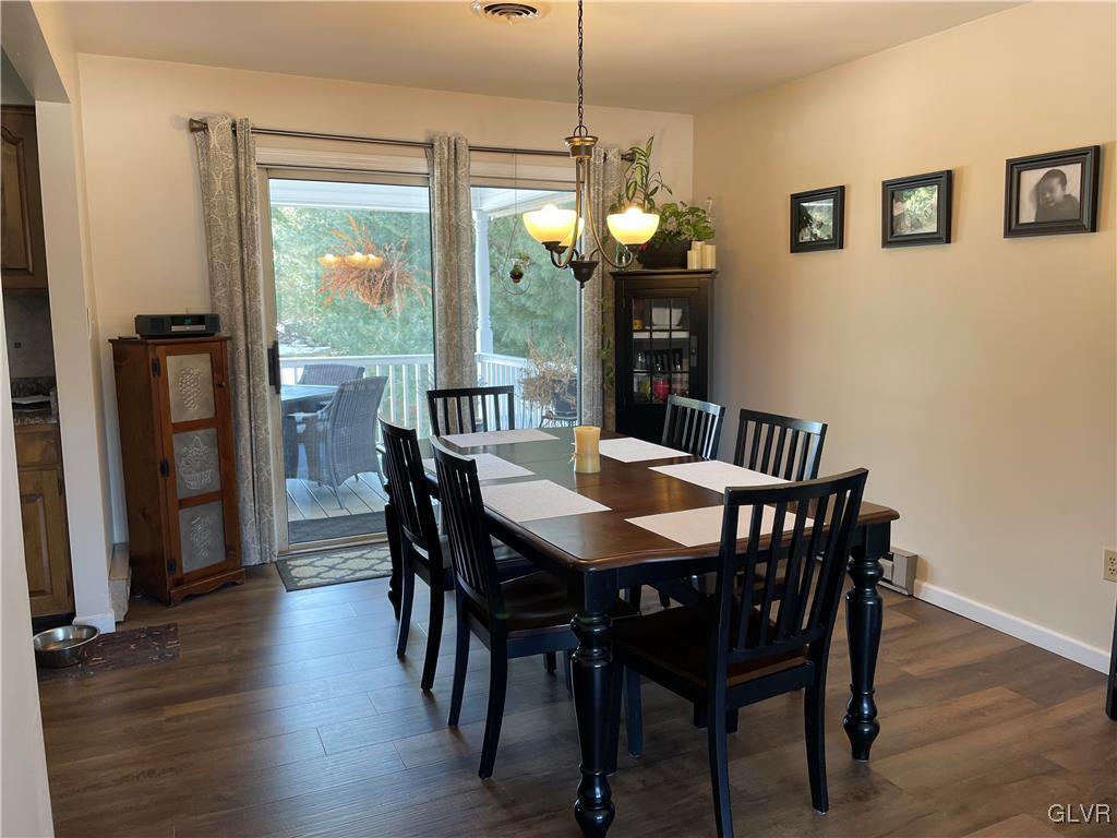 307 Gold Mill Road Wind Gap, PA 18091 - Photo 9 of 32 a view of a dining room with furniture window and wooden floor
