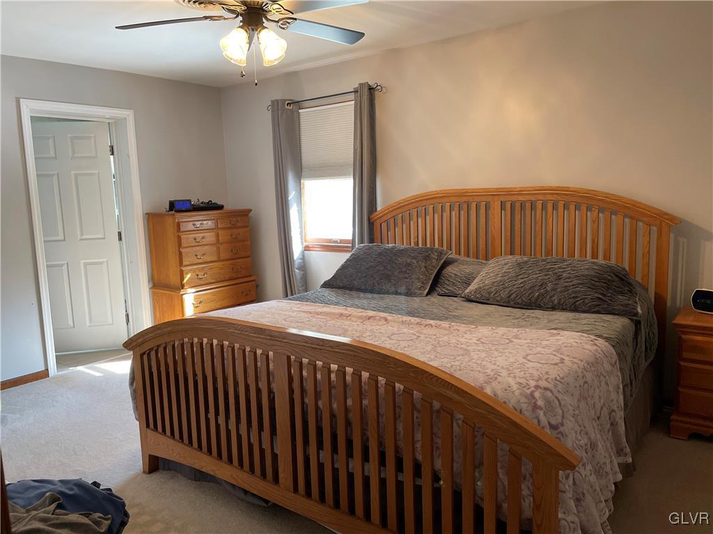 307 Gold Mill Road Wind Gap, PA 18091 - Photo 10 of 32 a bedroom with a bed and window