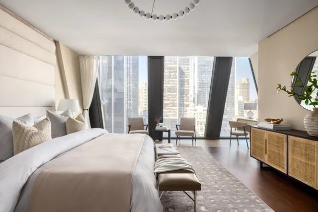 a bedroom with bed and window