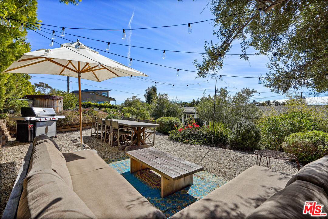 30081 Harvester Road Malibu, CA 90265 - Photo 31 of 33 a view of a backyard with sitting area
