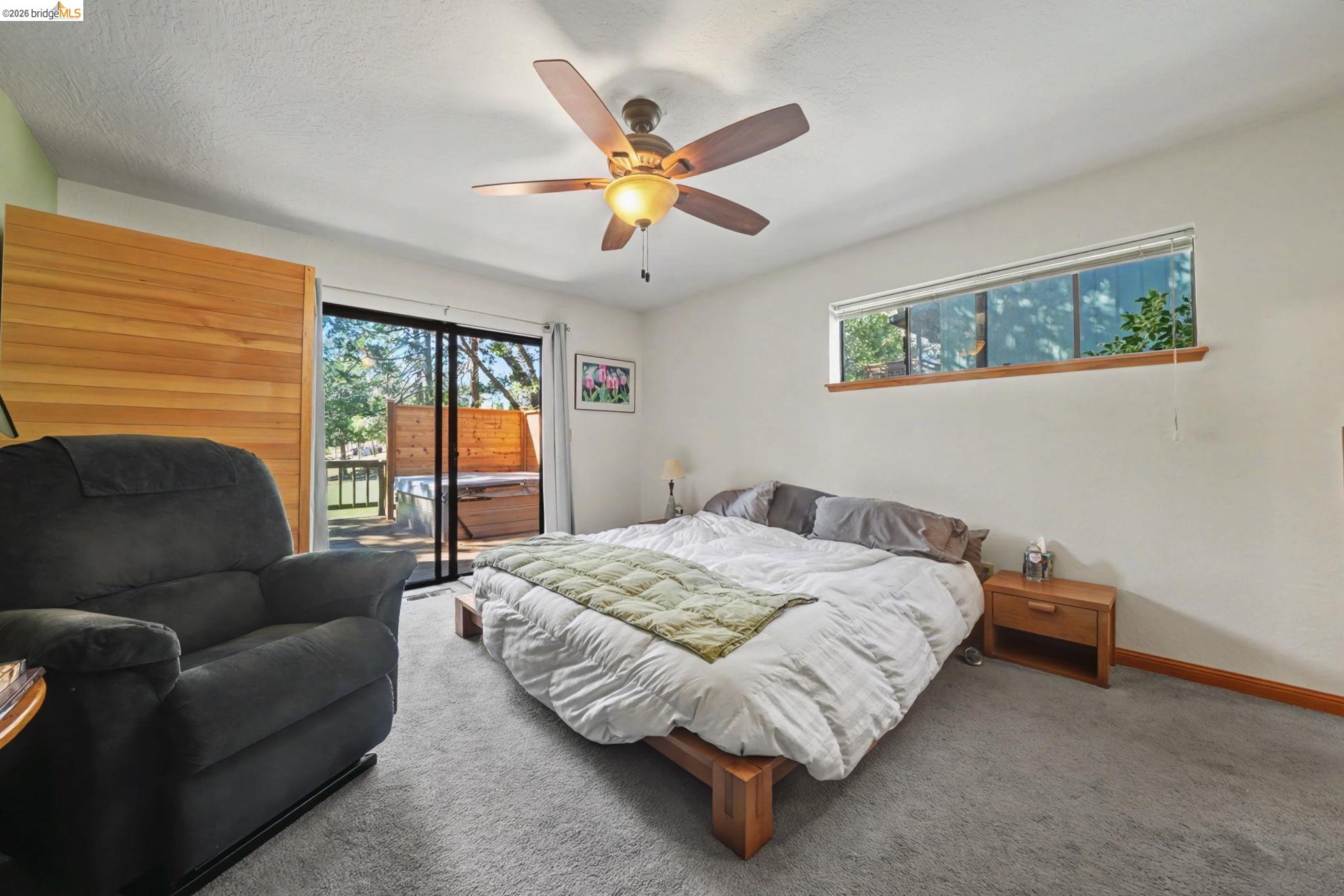 1554 Vine Maple Drive Murphys, CA 95247 - Photo 28 of 54 a bedroom with a bed and window