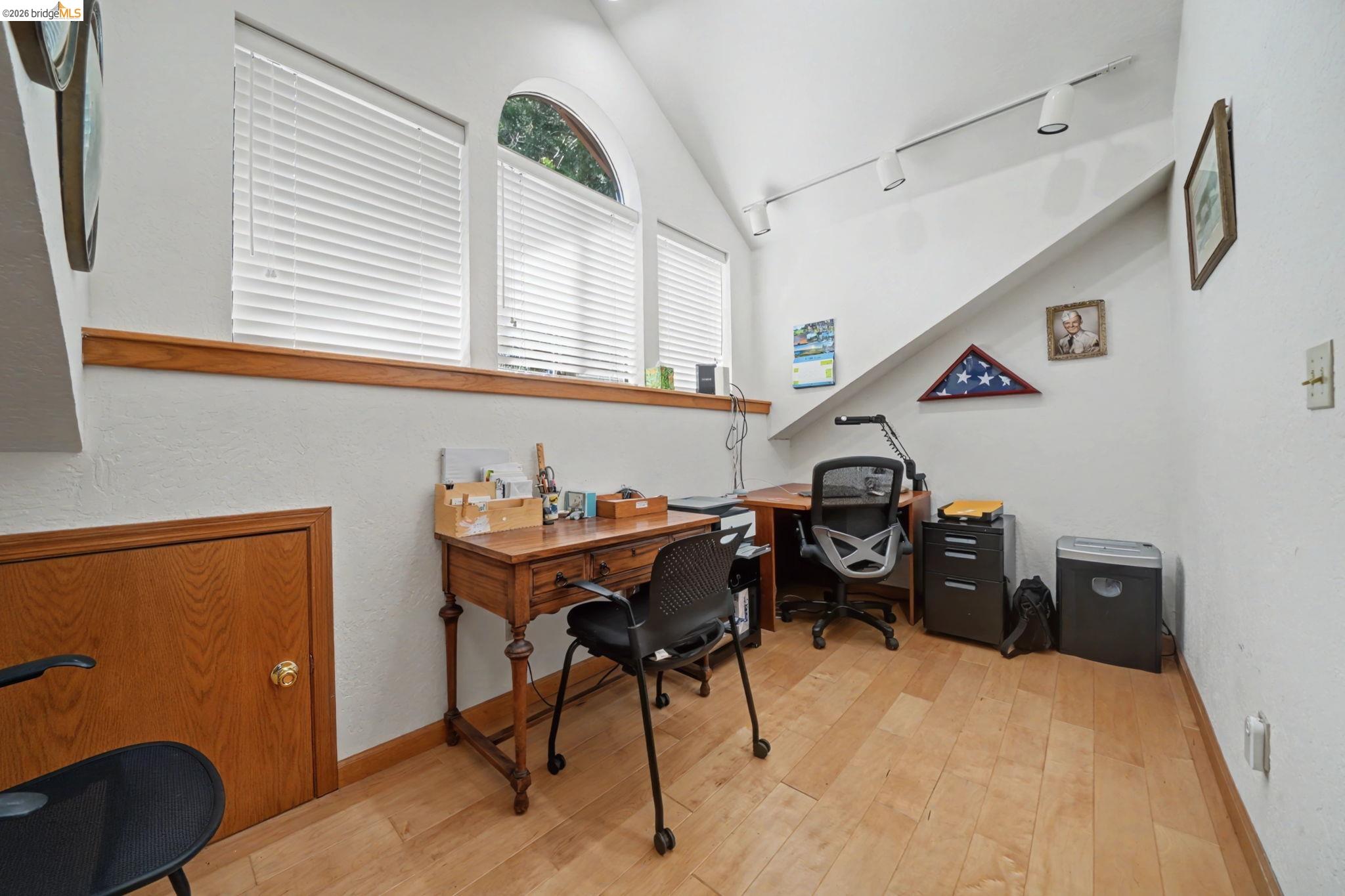 1554 Vine Maple Drive Murphys, CA 95247 - Photo 36 of 54 a view of a workspace with furniture and a window