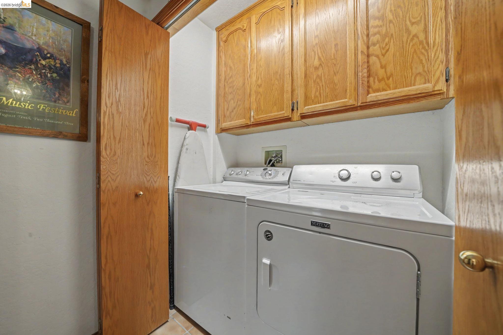 1554 Vine Maple Drive Murphys, CA 95247 - Photo 42 of 54 a utility room with dryer and washer